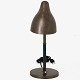 Roxy Klassik 
presents: 
Vilhelm 
Lauritzen / 
Louis Poulsen
Table lamp in 
patinated brass 
and green 
fluted ...