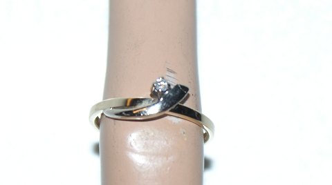 14 Carat gold ring with brilliant