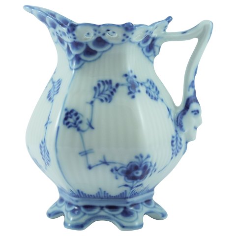 Royal Copenhagen, blue fluted full lace; A cream jug of porcelain #1031