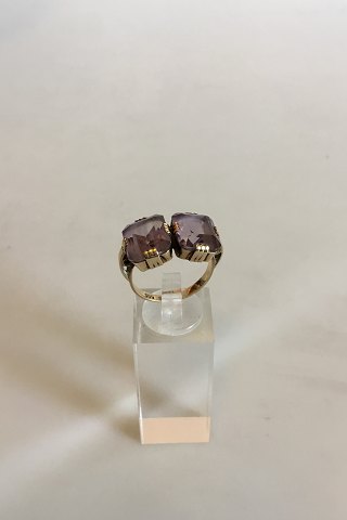 Gold ring with two Amethysts. 14 K