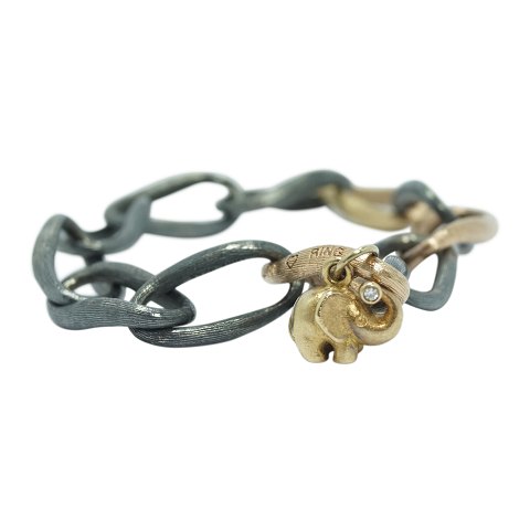 Ole Lynggaard, Charlotte Lynggaard; Love bracelet w. elephant/diamond pendant, 
18k gold and sterling silver