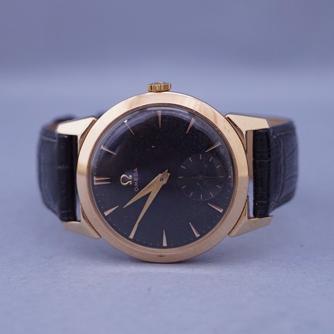 Omega; wrist watch in gold double from 1954