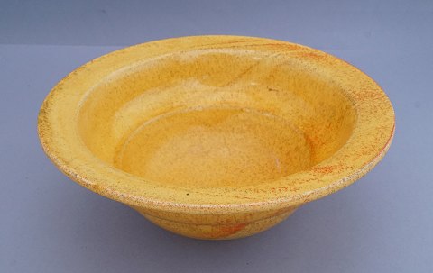Herman A. Kähler; bowl decorated with yellow uraniumglaze