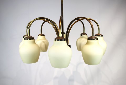 Chandelier or ceiling pendant of brass and light yellow shades by Fog Mørup from 
the 1960s.
5000m2 showroom.
