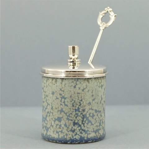 Arne Bang & Cohr; a mustard pot in stoneware with lid and spoon in hallmarked 
silver
