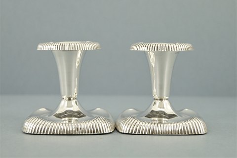 M. Gudmundsen & Søn; A pair of small candlesticks, silver