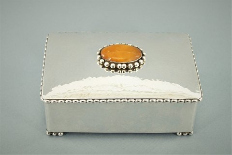 Evald Nielsen; A jewellery box of hallmarked silver, set with amber, 1923
