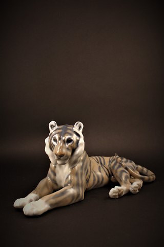 Royal Copenhagen porcelain figure of tiger, H:13cm. L:30.5cm. 
RC# 714.