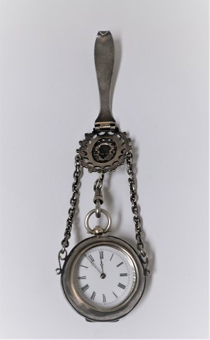 Silver ladies pocket watch. (800) with nice silver watch holder. The clock 
works. Produced 1860-1880. Key for winding included.