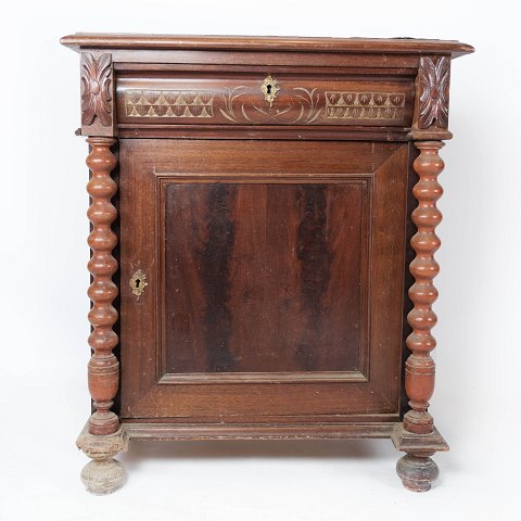 Smaller antique cabinet of mahogany decorated with carvings, from the 1880s. 
5000m2 showroom.