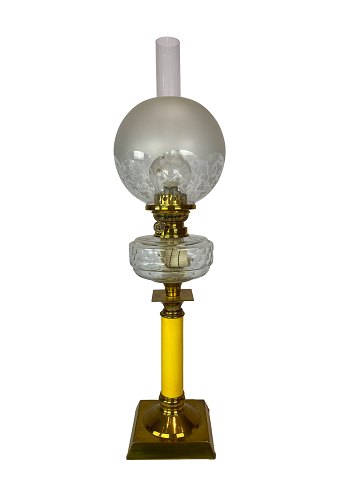 Kerosene lamp of brass with white opaline glass shade and yellow glass stem, 
from around the 1860s. 
5000m2 showroom.
Great condition
