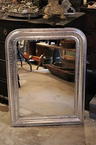 French 1800 century Louis Philippe silver fireplace mirror with fine decorated 
frame and original old mirror glass and fine patina.
H:93cm. W:71cm.
SOLD !