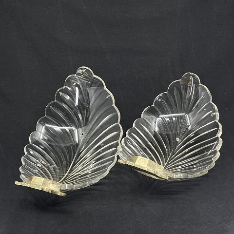 A pair of large leaves for a chandelier