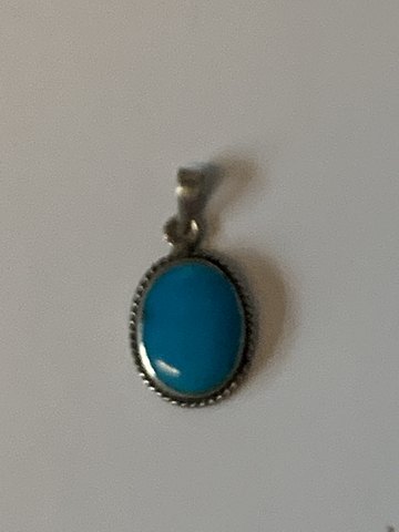 Silver pendant with turquoise
Stamped 925
Height 20.94 mm