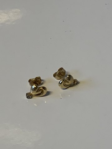 Earrings in 14 carat gold
Stamped 585
Height 8.08 mm approx