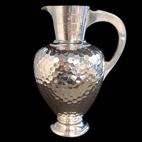 Grønlund; A pitcher in hallmarked silver