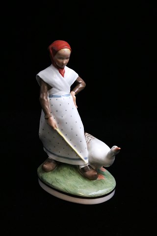 Royal Copenhagen porcelain figure of "goose girl" in overglaze. RC# 528. with 
the Julian mark.