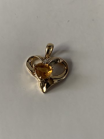 Pendant for necklace in 14 carat gold, with inlaid diamonds.