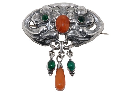 Hertz silver
Large Art Nouveau brooch with ambers and green stones