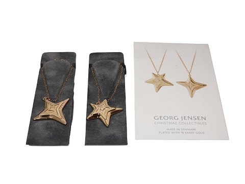 Georg Jensen Golden ChristmasFire og femkantede stjerner ornamenter fra 2021
