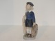 Royal Copenhagen figurine
June - boy with suitcase