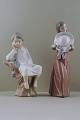 Two Lladro figurines in porcelain.
