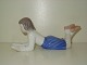 Bing & Grøndahl figur, Pige ligger og læser bog
Dek. Nummer 2304
