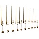 Pierre Forsell, b. 1925, d. 2004. A set of 14 "pendulum" wall mounted brass 
candlesticks. Manufactured and marked by Skultuna, Sweden.