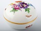 Meissen lidded box decorated with flowers. 
