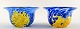 A pair of Kosta Boda, Ulrica H. Vallien art glass bowls.
