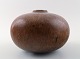 Saxbo. Stoneware vase in modern design, glaze in brown tones.
