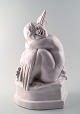 Large Hjorth (Bornholm) glazed stoneware figure in the form of a boy / faun 
embracing bird.