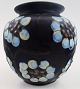 Kähler, Denmark, glazed stoneware vase decorated with flowers.
Beautiful dark blue glaze.