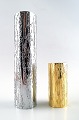 2 modern design metal vases, silver and gold.
Selected by the Museum of Modern Art, NY.