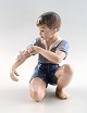 Figurine number 1270, boy with mouse by Jens Peter Dahl Jensen.
