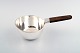 Cohr, Denmark sauce pan in silver. Rosewood handle.
