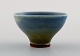 Berndt Friberg (1899-1981), Gustavsberg Studio.
Miniature bowl, glaze in blue and green shades.