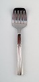 Georg Jensen Silver Bernadotte Herring / Sardine Serving Fork, fork in stainless 
steel.