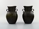 A pair of Just Andersen Art deco vases, number D 132. "Disko metal".
