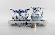 Royal Copenhagen full lace.
Royal Copenhagen porcelain. Sugar bowl and creamer on tray in blue fluted full 
lace No. 1113, no. 1195 and no. 1032.