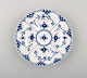 Blue Fluted Full Lace Royal Copenhagen porcelain dinnerware. 
23 plates no. 1/1087.