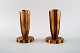 Tinos style art deco, a pair of candlesticks in bronze.
