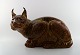 Karl Larsen (1897-1977) for Royal Copenhagen.
Huge and rare lynx in stoneware, decorated with brown glaze.