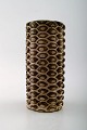 Axel Salto for Royal Copenhagen: Vase af stentøj modelleret med knopper i 
relief, dekoreret med sungglasur.