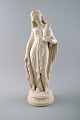 Large English Minton biscuit figure of woman.

