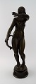 Just Andersen 1884-1943. Stor og sjælden figur af patineret diskometal i form af 
stående nøgen kvinde.