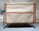 Verner Panton : Magazine holder with chromed frame of steel. Suspended with 
canvas with leather edges.