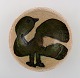Unika keramikskål af Sten Lykke Madsen, eget værksted.  
Dekoreret med fugl.