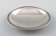 Just Andersen b. Godhavn, Greenland 1884, d. Glostrup 1943.
Rare dish of sterling silver 1940s.