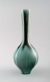 Friberg "Selecta" large ceramic vase for Gustavsberg.
Fantastic glaze in turquoise green shade.
